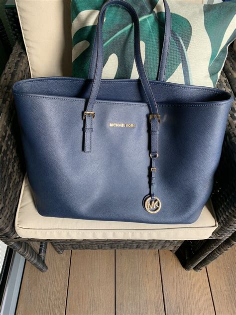 michael kors jet set navy purse|Michael Kors jet set airplane.